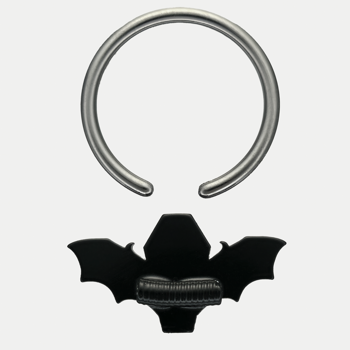 back side of red coffin bat septum ring