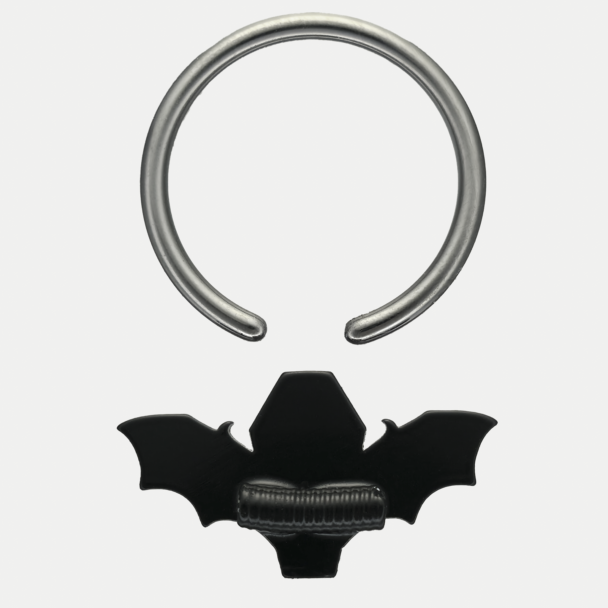 back side of red coffin bat septum ring