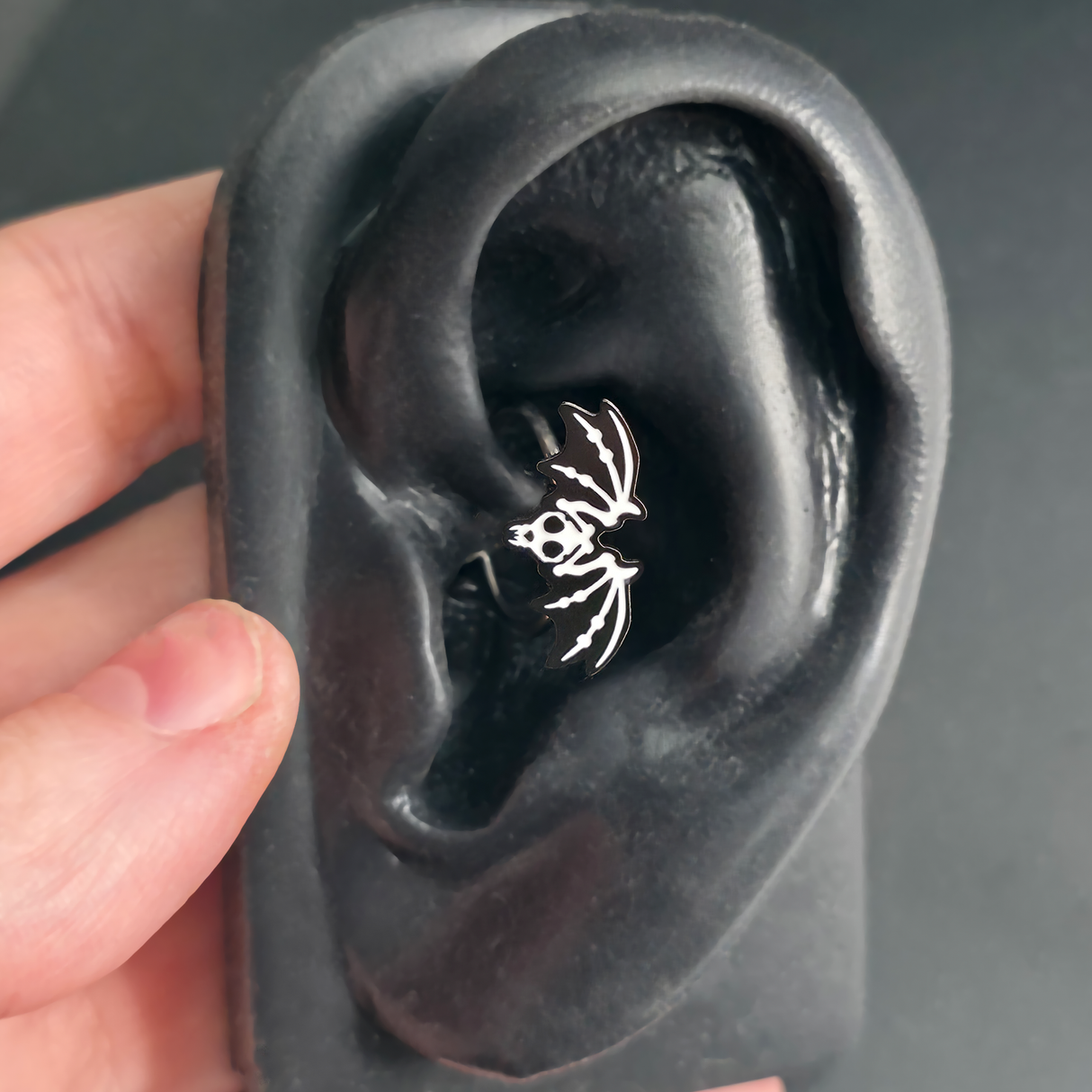 bat skeleton daith earring in ear