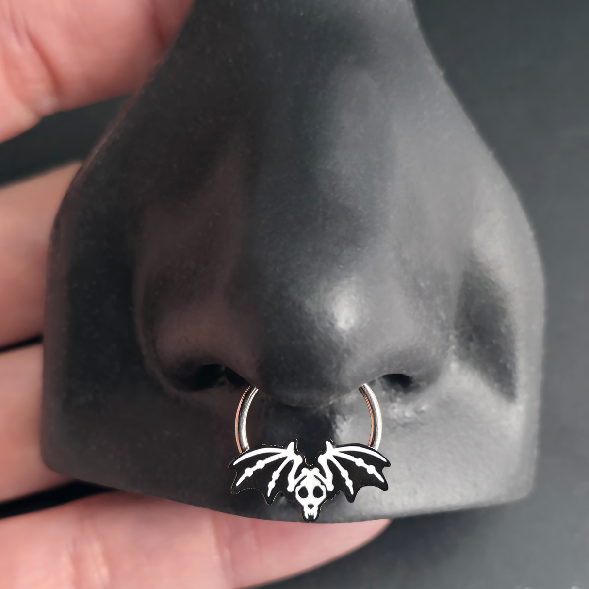 bat skeleton septum ring in nose