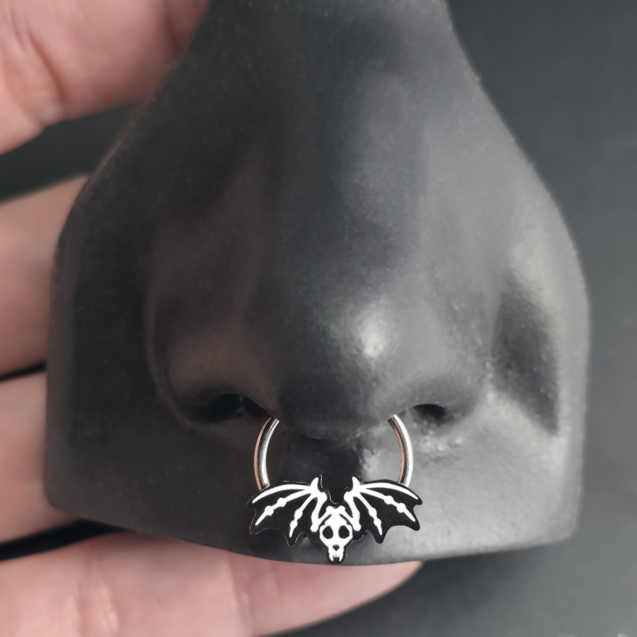bat skeleton septum ring in nose