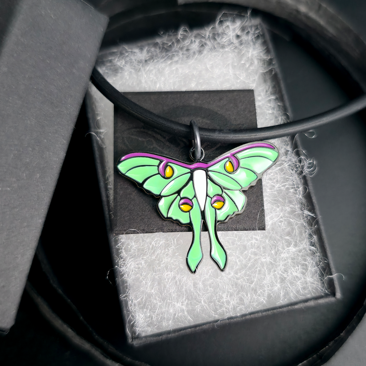 luna moth necklace in jewelry box