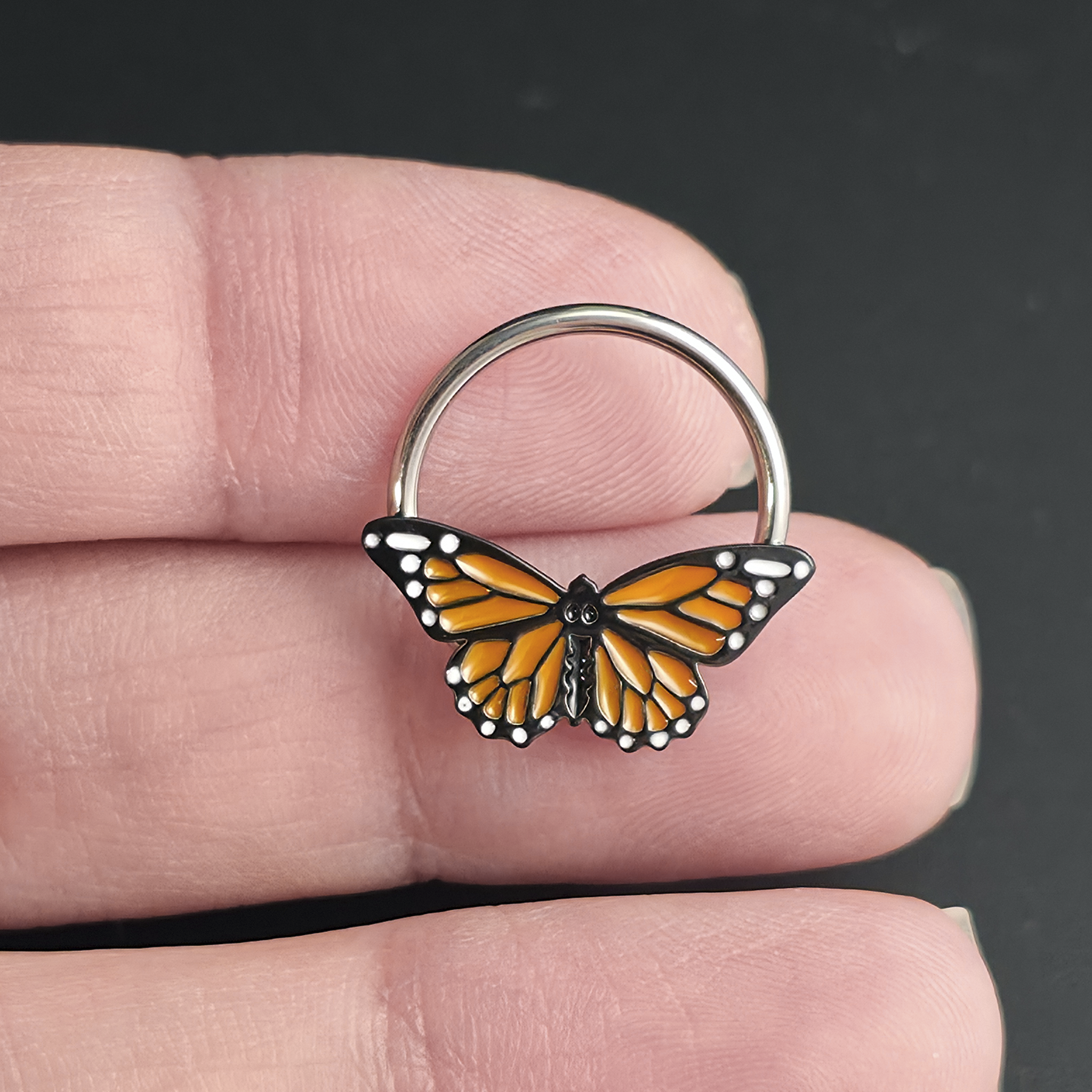 monarch butterfly captive ring on hand