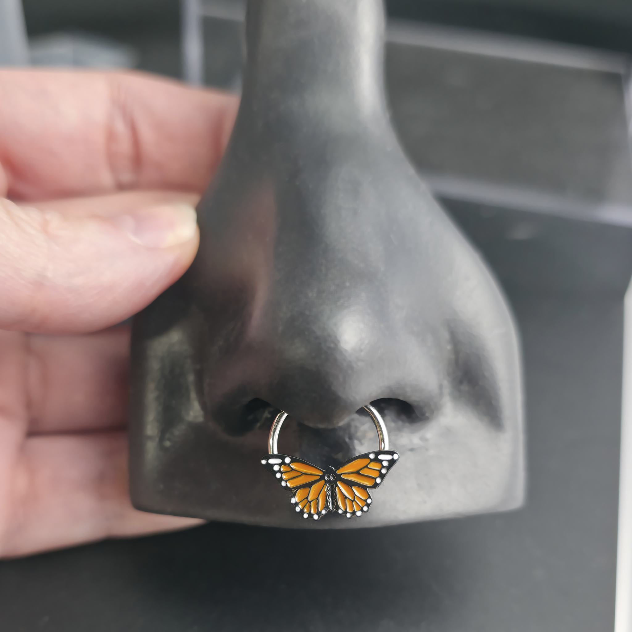 monarch butterfly septum ring in nose