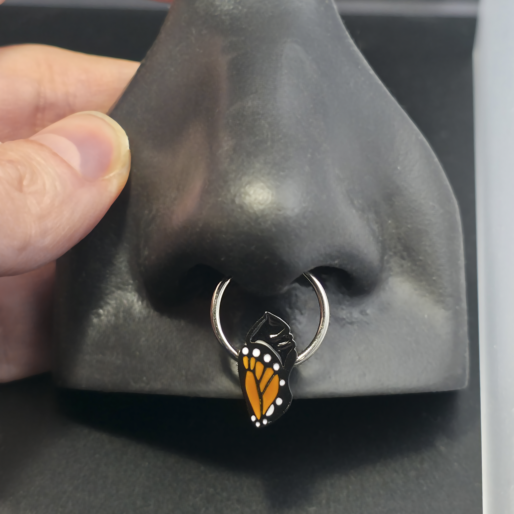 monarch chrysalis septum ring in nose
