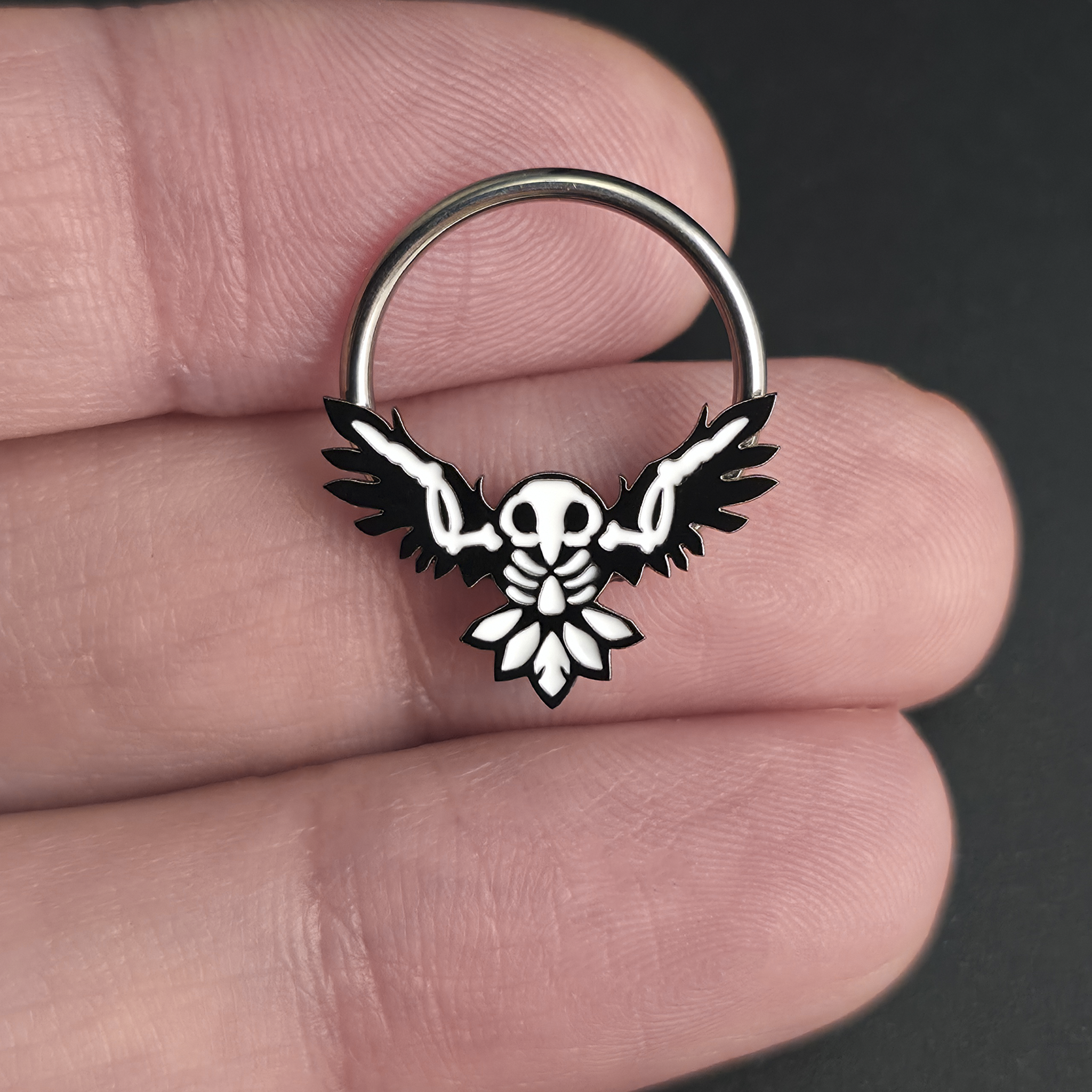 owl skeleton captive bead ring on hand