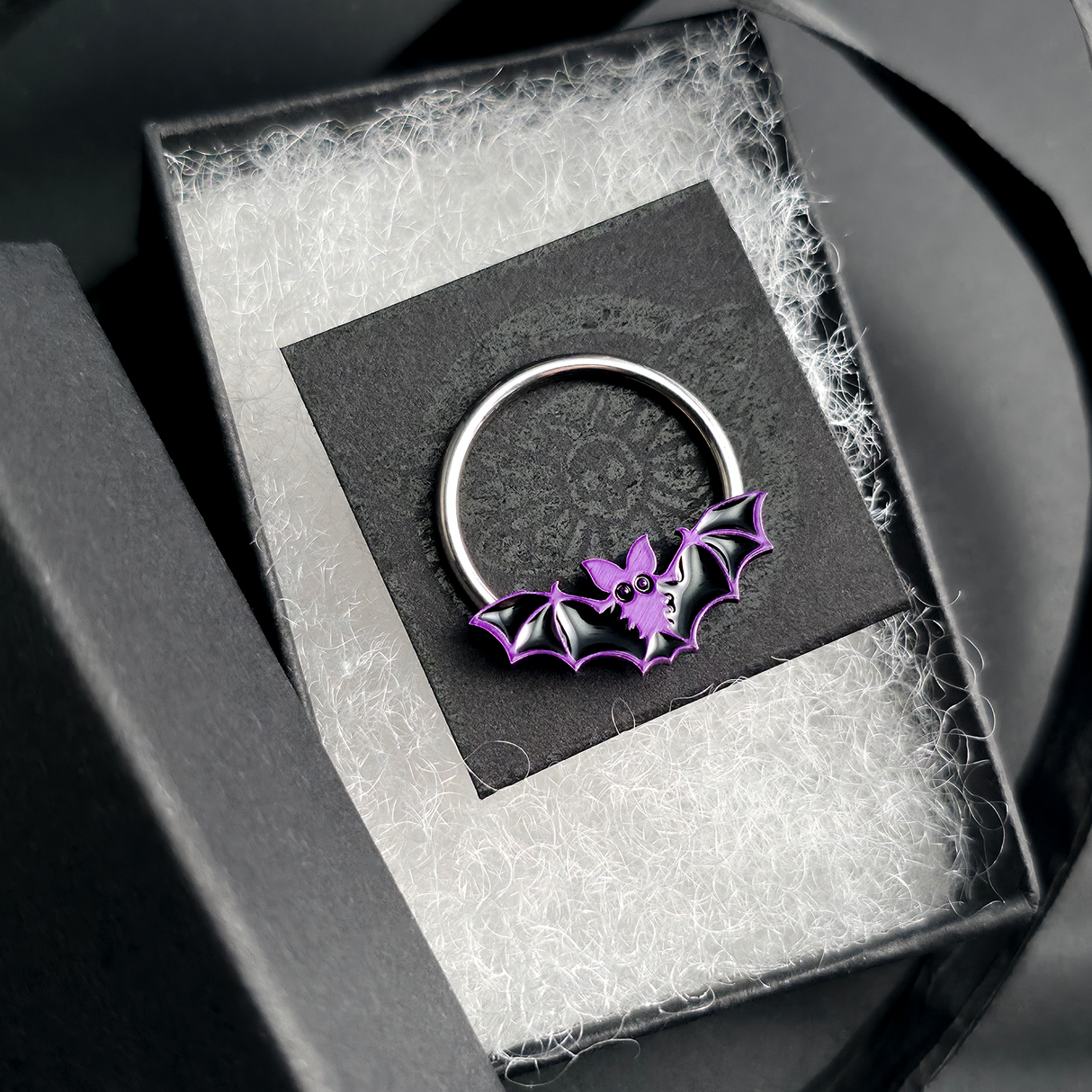 halloween bat septum ring in jewelry box
