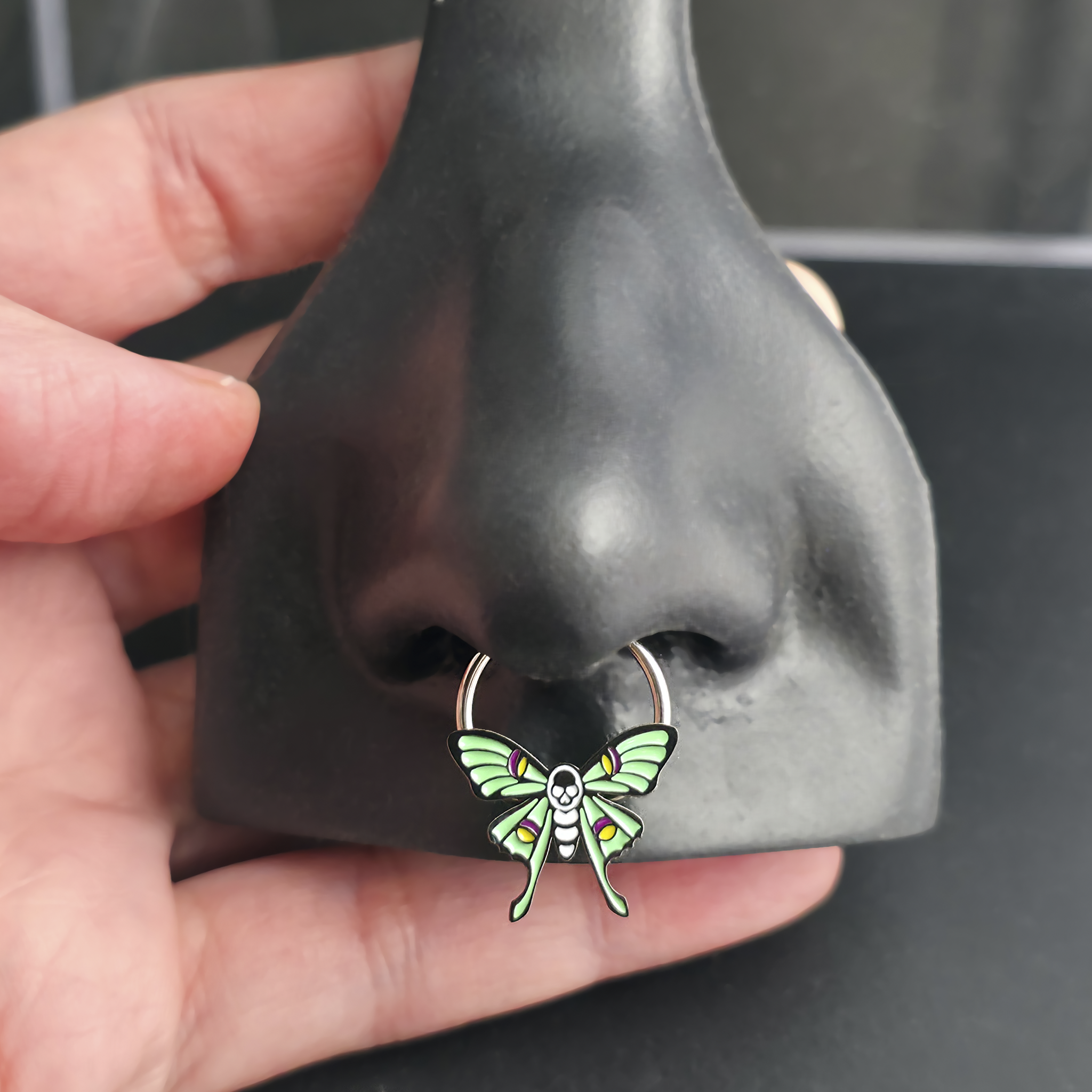 skull luna moth septum ring in nose