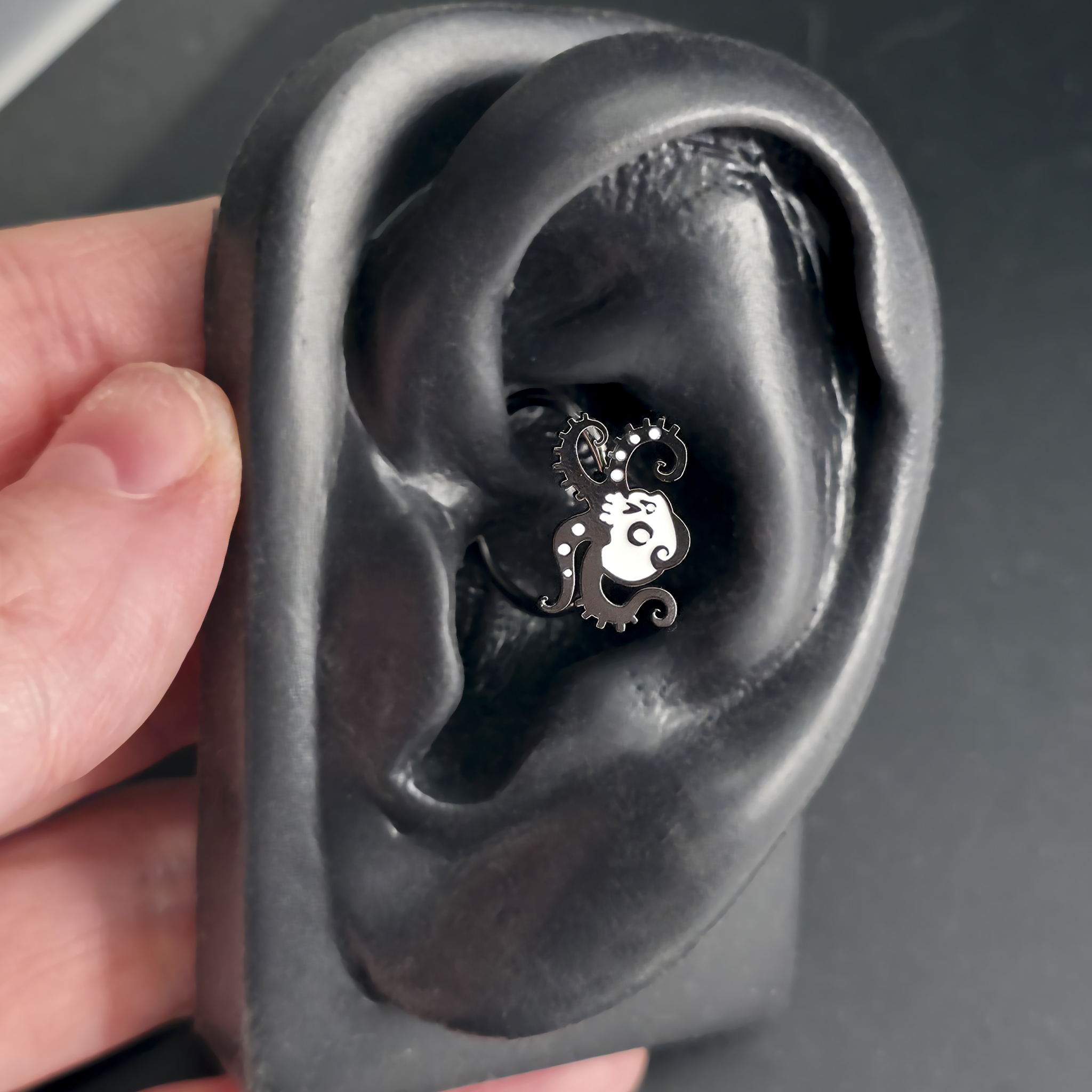 skull octopus daith earring in ear