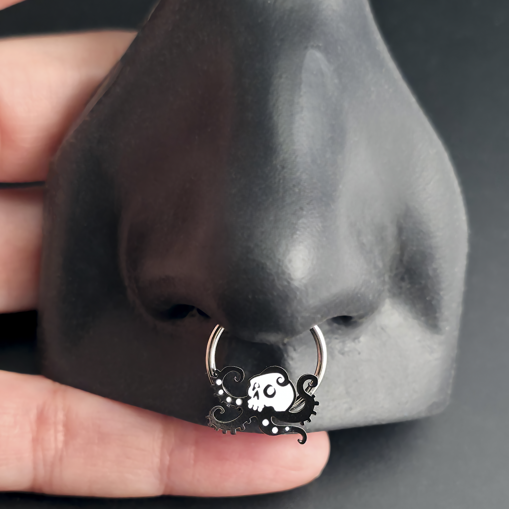 skull octopus septum ring in nose