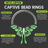 Metal Lotus captive bead ring with green luna moth design on a dark background