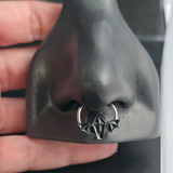 black coffin bat septum ring in nose