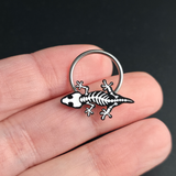 crested gecko skeleton septum ring on hand