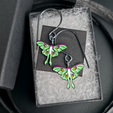 luna moth dangle earrings in jewelry box