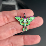 luna moth necklace pendant charm on hand