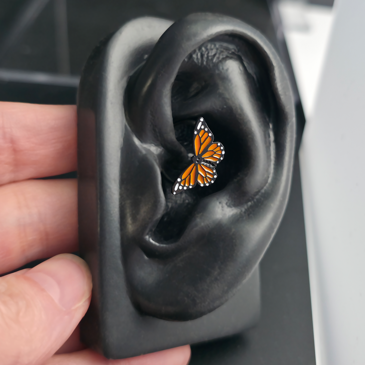 monarch butterfly daith earring in ear