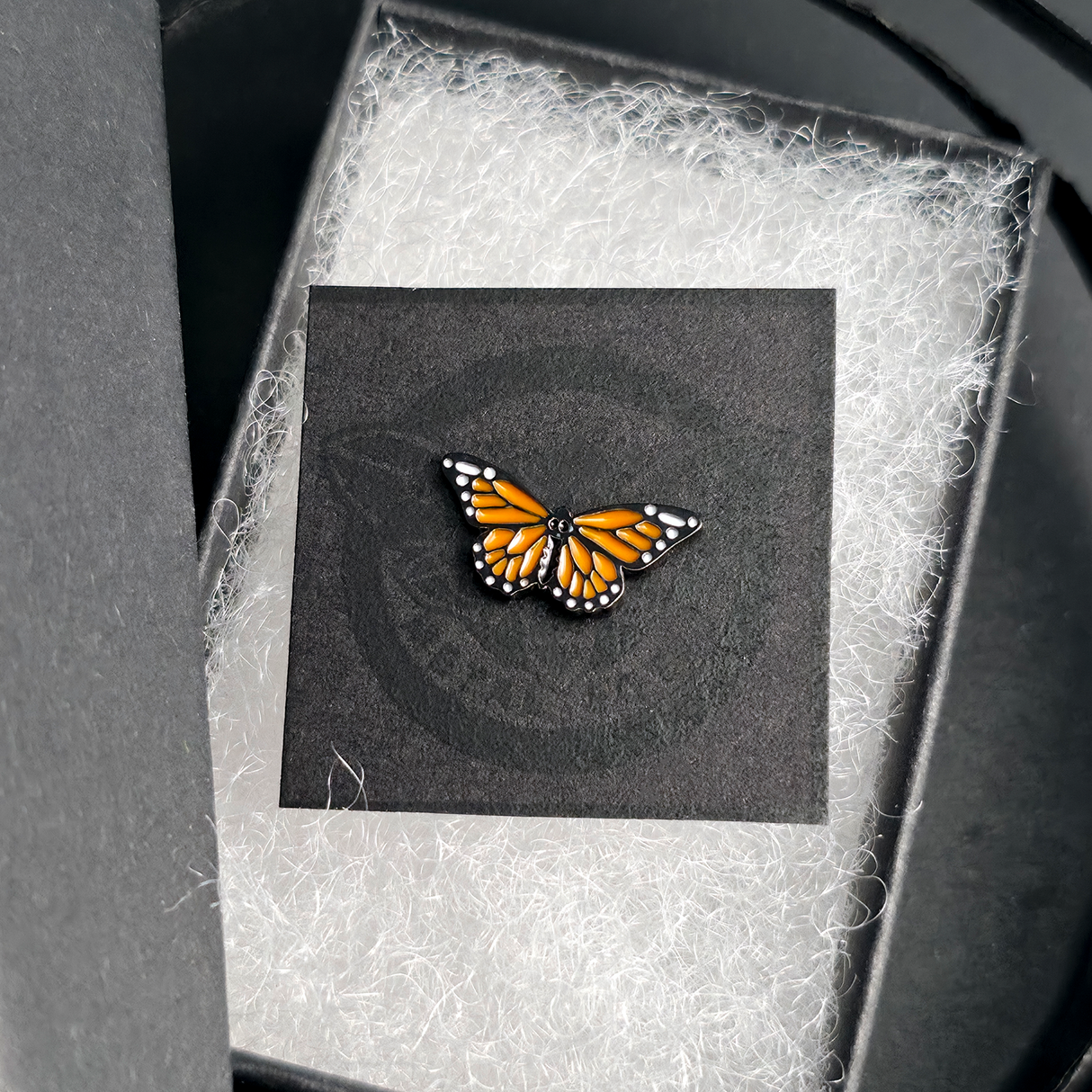 monarch butterfly nose stud and earring in a jewelry box