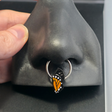 monarch chrysalis septum ring in nose