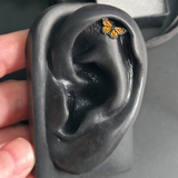 monarch butterfly stud earring in a helix piercing