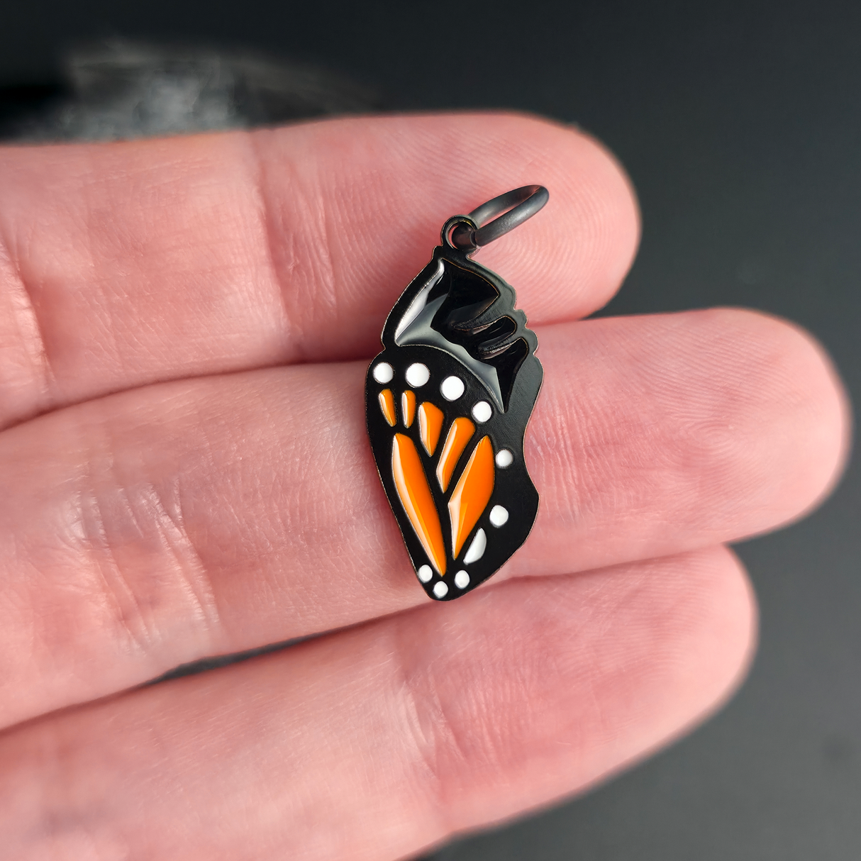 monarch butterfly necklace pendant charm on hand