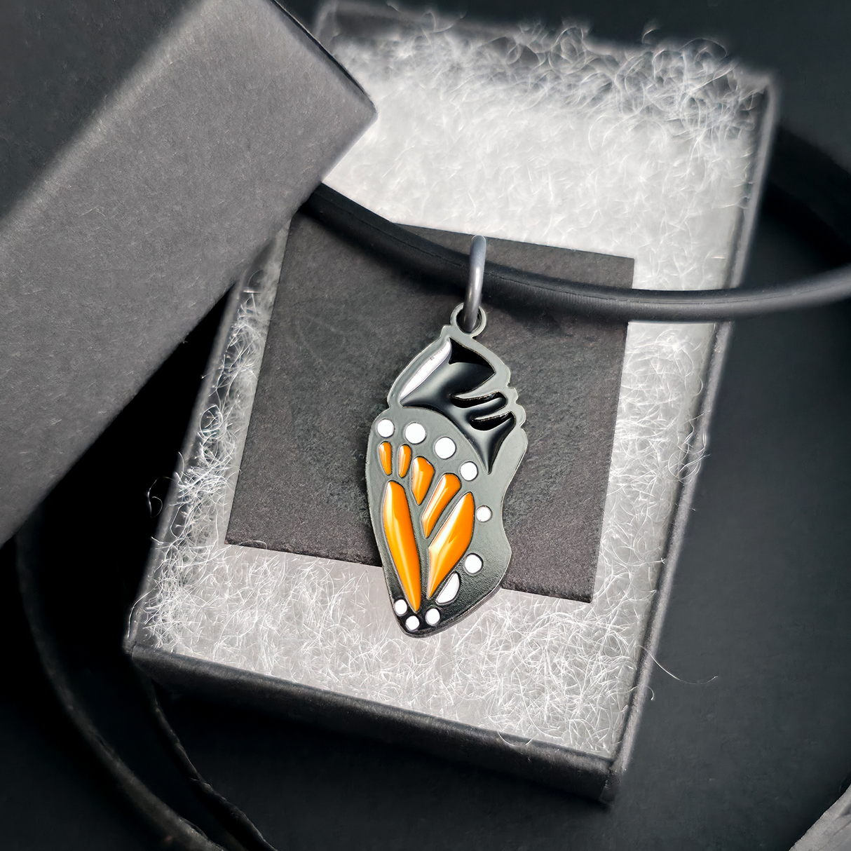 monarch butterfly chrysalis necklace in jewelry box