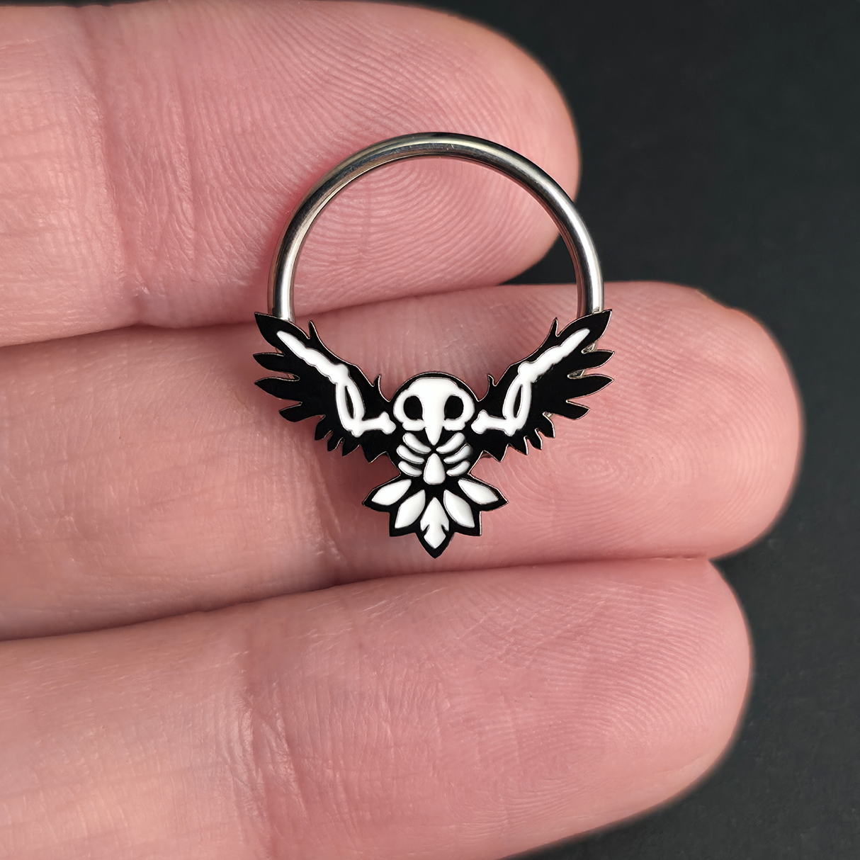 owl skeleton captive bead ring on hand
