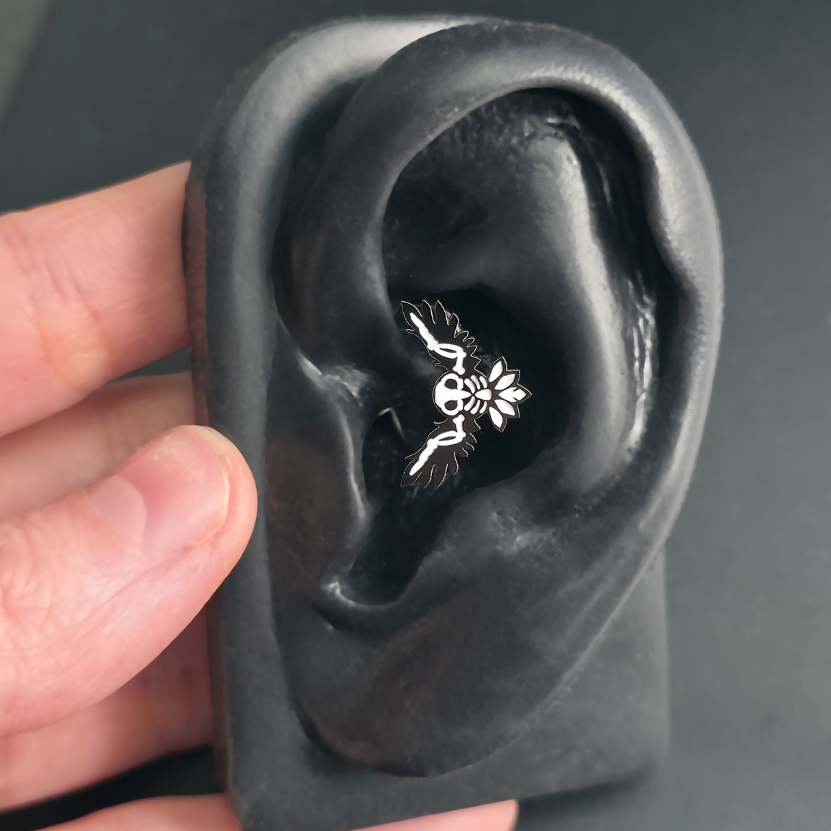 owl skeleton daith earring in ear
