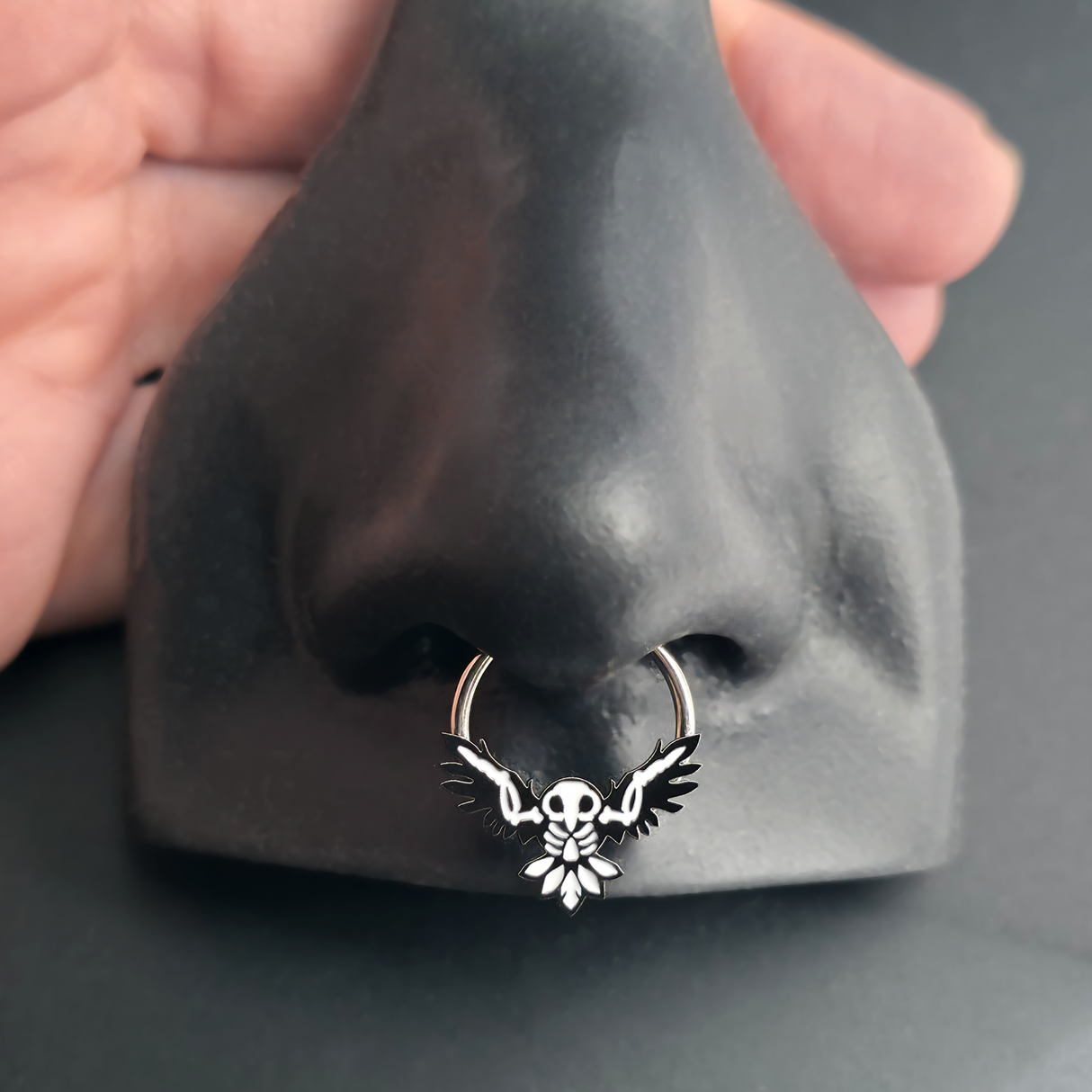 owl skeleton septum ring in nose