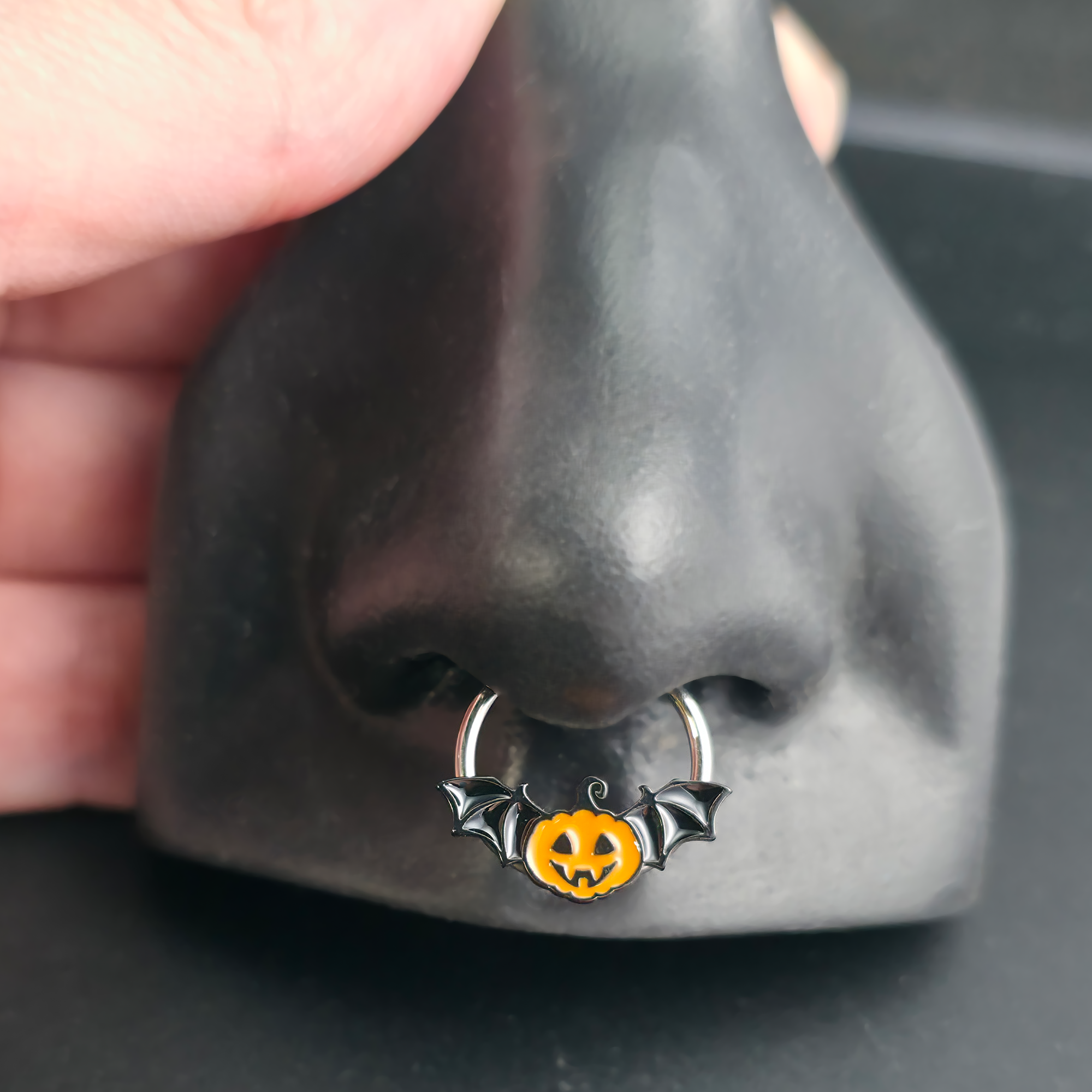 halloween pumpkin bat septum ring in nose