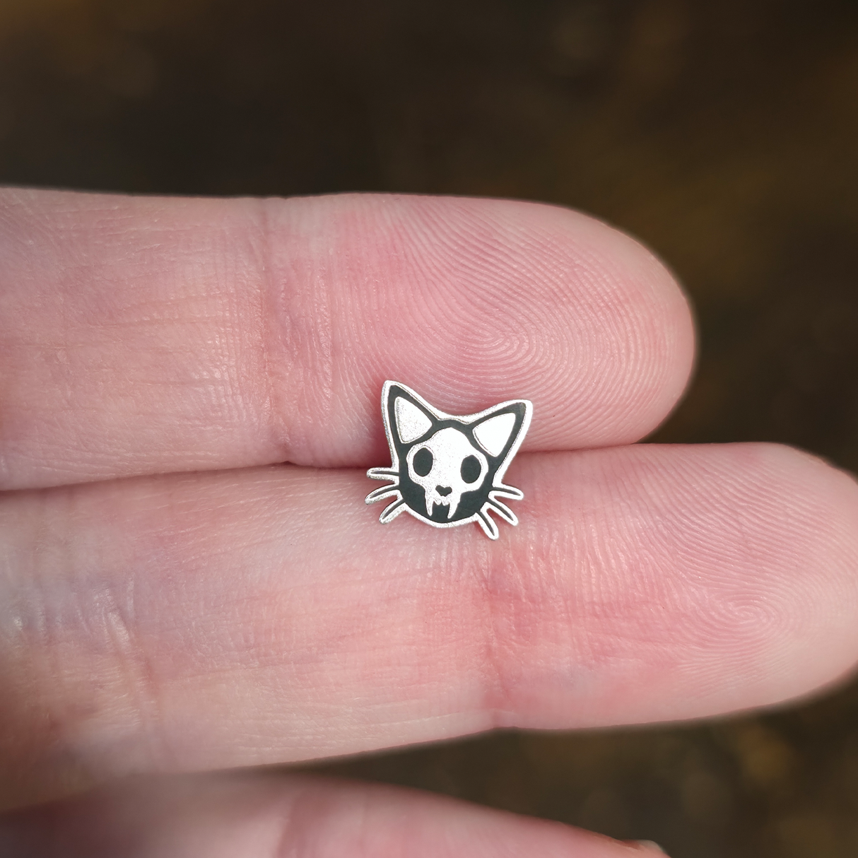 threadless cat skull nose stud and earring