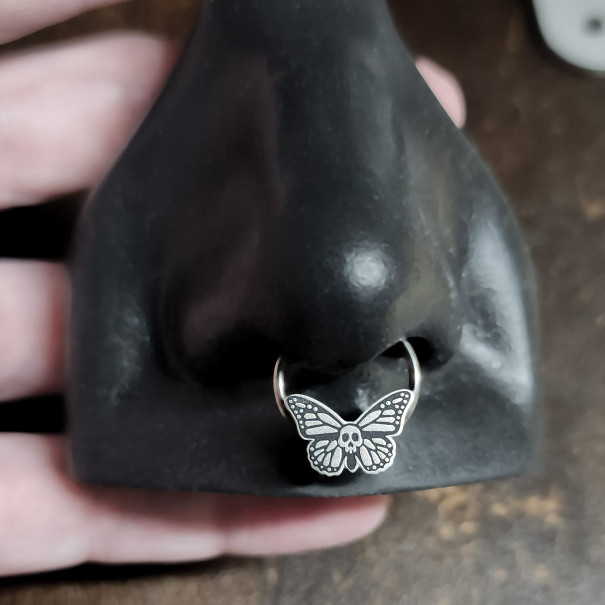 skull butterfly septum ring