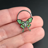 skull luna moth septum ring on hand