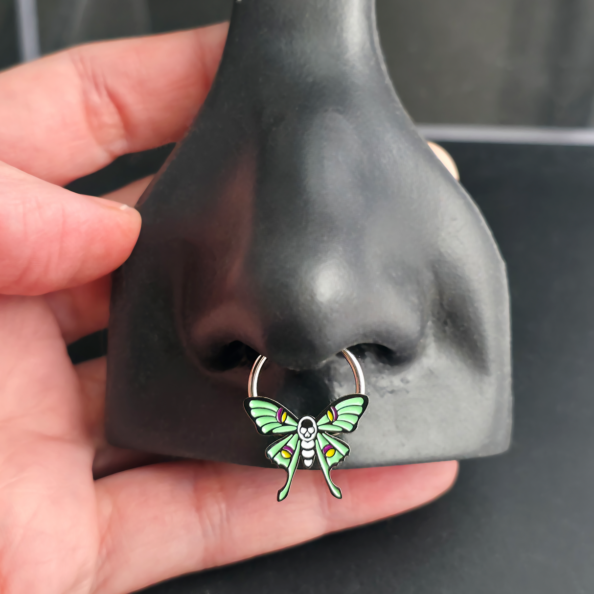 skull luna moth septum ring in nose