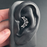 spiderweb daith earring in ear